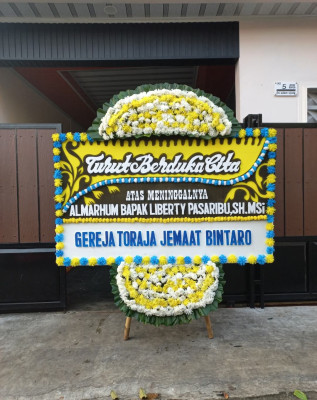 Papan Bunga Duka di Namo Gajah